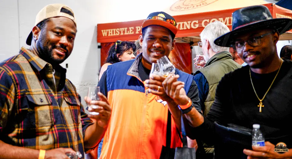 Attendees enjoying the inaugural Peaks and Pours spirits festival at Meanwhile Block in Colorado Springs