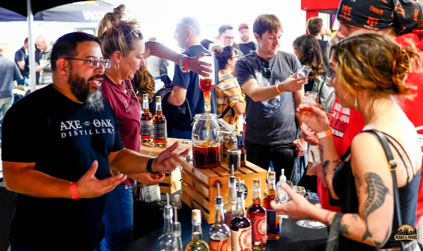 Axe and Oak Distillery tasting station at Peaks and Pours 2023