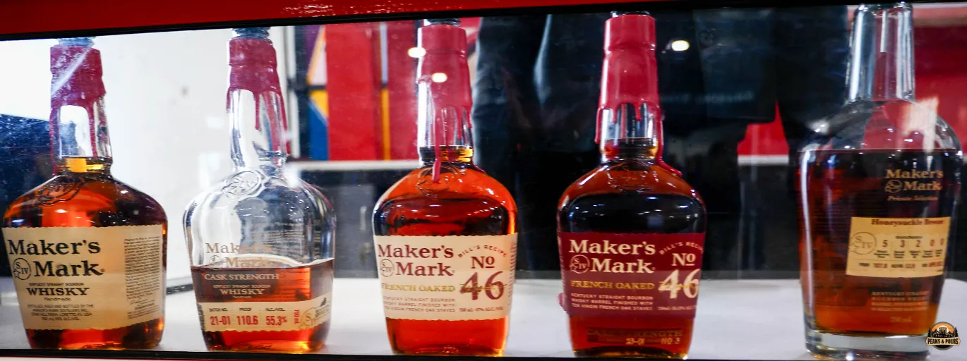 Makers Mark distillery lineup at Peaks and Pours 2023 featuring Original, Cask Strength, 46 French Oak, and Honeysuckle Breeze expressions