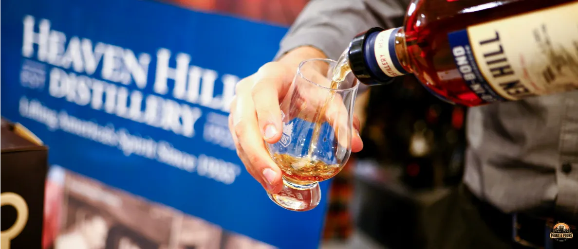 Pour of Heaven Hill 7 Year Bottled in Bond at the Heaven Hill distillery booth at Peaks and Pours 2023